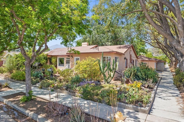 339 2nd St, Fillmore, CA 93015 - view of front of home featuring stucco siding and a chimney