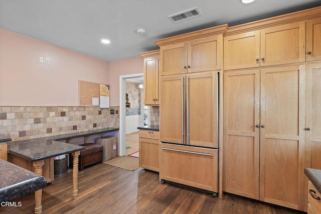 339 2nd St, Fillmore, CA 93015 - kitchen featuring paneled fridge, backsplash, dark wood-type flooring, recessed lighting, and light brown cabinetry