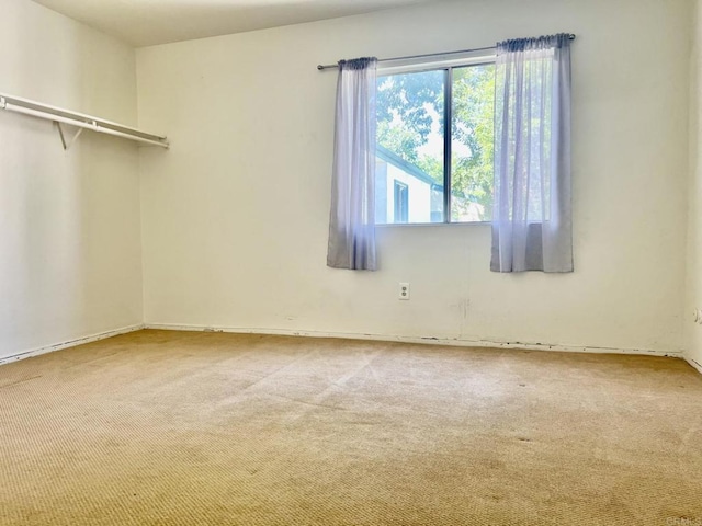 1817 E Grand Ave Unit 72, Escondido, CA 92027 - spare room featuring carpet and baseboards
