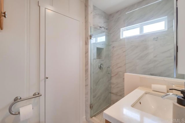418 Dewey St, San Diego, CA 92113 - bathroom with a shower stall and vanity