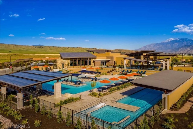 1578 Harmonie Ln, Beaumont, CA 92223 - community pool with a mountain view and a patio