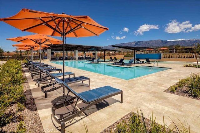 1578 Harmonie Ln, Beaumont, CA 92223 - community pool with a patio area and a mountain view