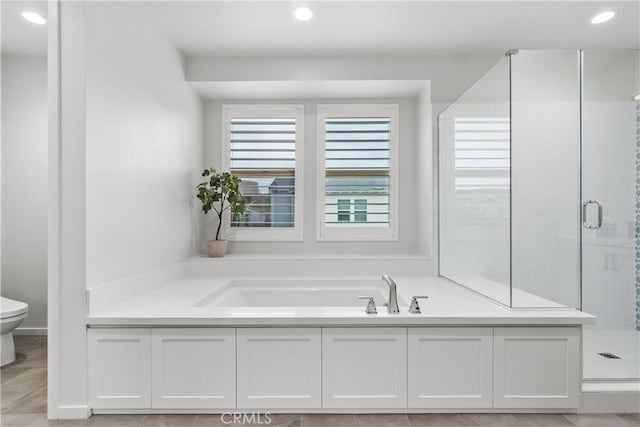 40 Jarano St, Rancho Mission Viejo, CA 92694 - bathroom with toilet, a shower stall, recessed lighting, and a garden tub