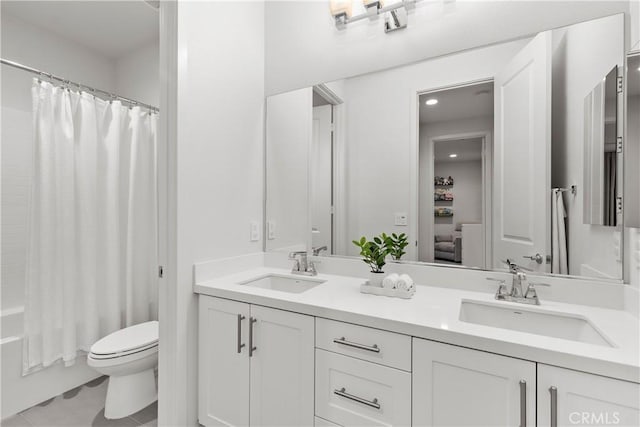 40 Jarano St, Rancho Mission Viejo, CA 92694 - bathroom with toilet, double vanity, tile patterned floors, shower / bath combo, and recessed lighting