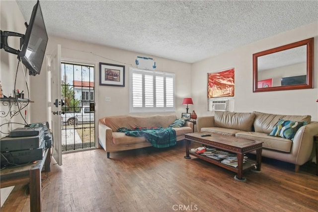 14508 Kingsdale Ave, Lawndale, CA 90260 - living room with a textured ceiling, hardwood / wood-style flooring, healthy amount of natural light, and cooling unit
