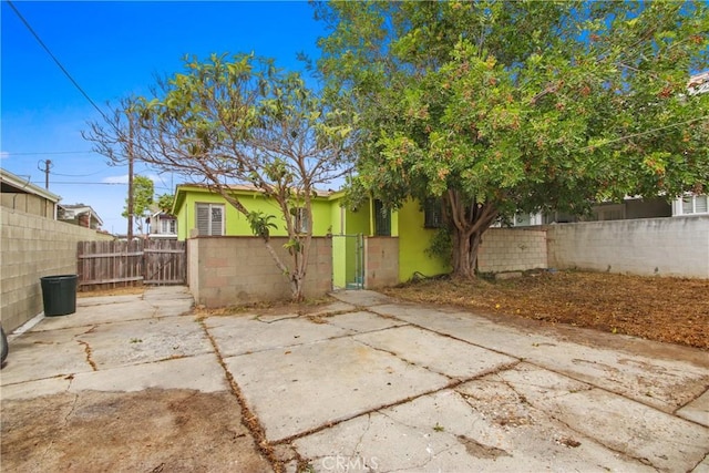 14508 Kingsdale Ave, Lawndale, CA 90260 - view of patio featuring a fenced front yard and a gate