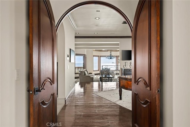 2 60th Pl, Long Beach, CA 90803 - hallway with ornamental molding, dark wood-type flooring, arched walkways, and recessed lighting