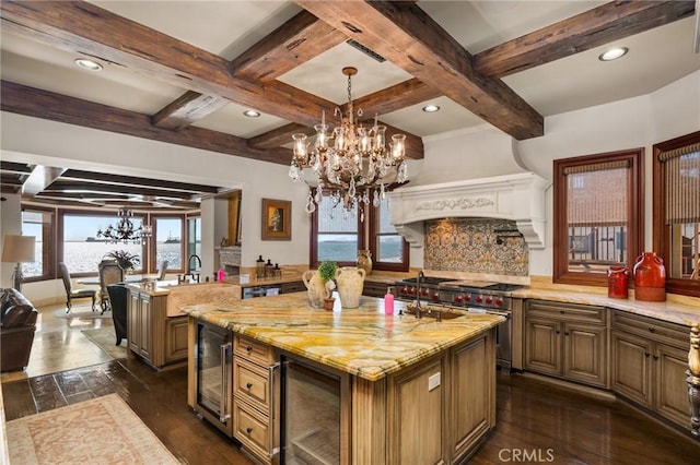 2 60th Pl, Long Beach, CA 90803 - kitchen featuring a chandelier, beverage cooler, coffered ceiling, dark wood-style floors, and range with two ovens