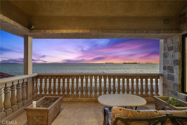 2 60th Pl, Long Beach, CA 90803 - patio terrace at dusk featuring a water view and a balcony