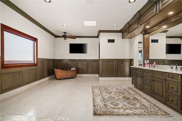 2 60th Pl, Long Beach, CA 90803 - full bath with a decorative wall, crown molding, ceiling fan, double vanity, and a wainscoted wall