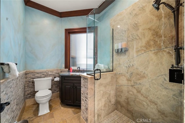 2 60th Pl, Long Beach, CA 90803 - bathroom with crown molding, a stall shower, toilet, vanity, and tile walls