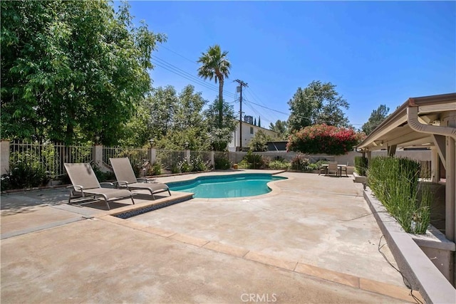17206 Nugent Pl, Granada Hills, CA 91344 - view of swimming pool featuring a patio and a fenced backyard