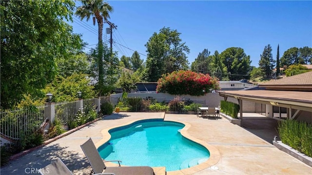 17206 Nugent Pl, Granada Hills, CA 91344 - view of swimming pool with a patio and a fenced backyard