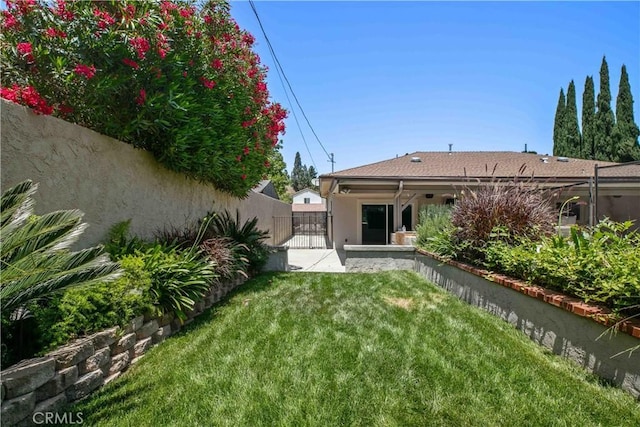 17206 Nugent Pl, Granada Hills, CA 91344 - rear view of property with stucco siding and a gate