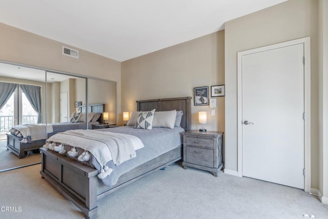 143 W Colorado Blvd, Monrovia, CA 91016 - bedroom with light colored carpet, a closet, and baseboards