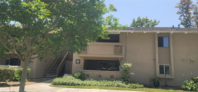 8788 Coral Springs Ct Unit 206A, Huntington Beach, CA 92646 - view of building exterior with stairs