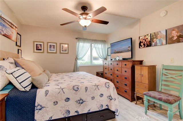 8788 Coral Springs Ct Unit 206A, Huntington Beach, CA 92646 - bedroom featuring light wood finished floors and ceiling fan