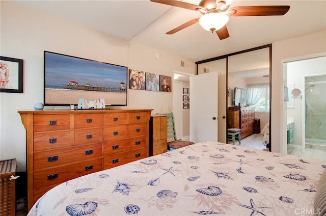 8788 Coral Springs Ct Unit 206A, Huntington Beach, CA 92646 - bedroom with a closet, ensuite bath, and ceiling fan