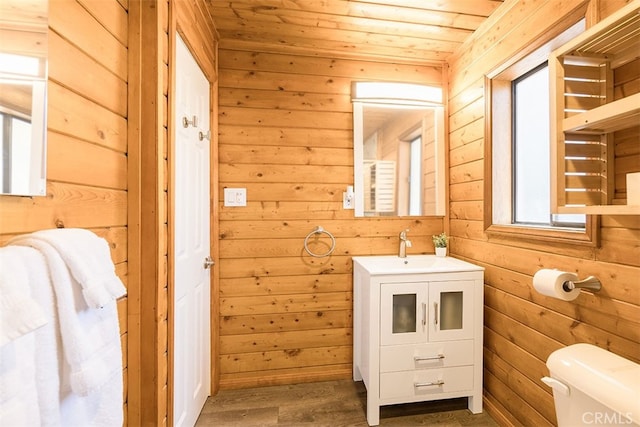 670 Marin Rd, Big Bear Lake, CA 92315 - bathroom featuring toilet, vanity, wooden walls, wooden ceiling, and wood finished floors