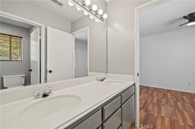 27834 Lassen St, Castaic, CA 91384 - bathroom featuring double vanity and wood finished floors