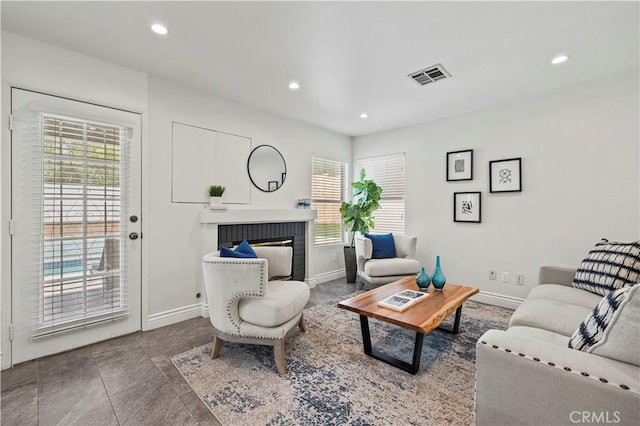 27834 Lassen St, Castaic, CA 91384 - living area featuring a brick fireplace and recessed lighting