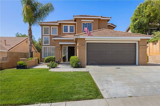 27834 Lassen St, Castaic, CA 91384 - view of front facade with stucco siding, driveway, a tile roof, and an attached garage