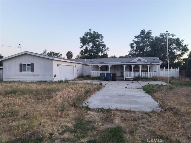 3858 Carter St, Riverside, CA 92501 - view of front of home with a porch and an attached garage