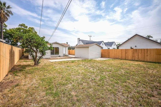 784 W 17th St, San Bernardino, CA 92405 - view of yard with a patio and an outbuilding