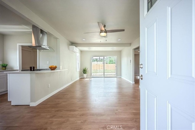 784 W 17th St, San Bernardino, CA 92405 - unfurnished living room featuring a ceiling fan, light wood-style floors, baseboards, and recessed lighting