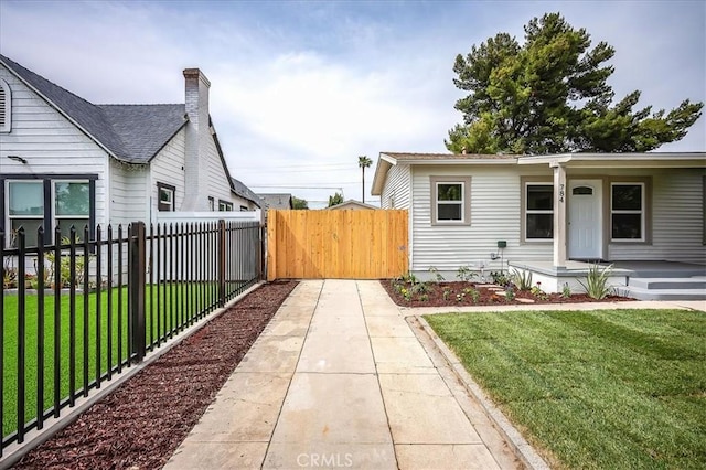 784 W 17th St, San Bernardino, CA 92405 - view of front of house featuring covered porch and a gate