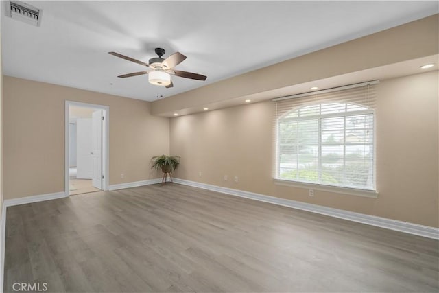 1641 Ford St, Redlands, CA 92373 - unfurnished room with a ceiling fan, wood finished floors, baseboards, and recessed lighting
