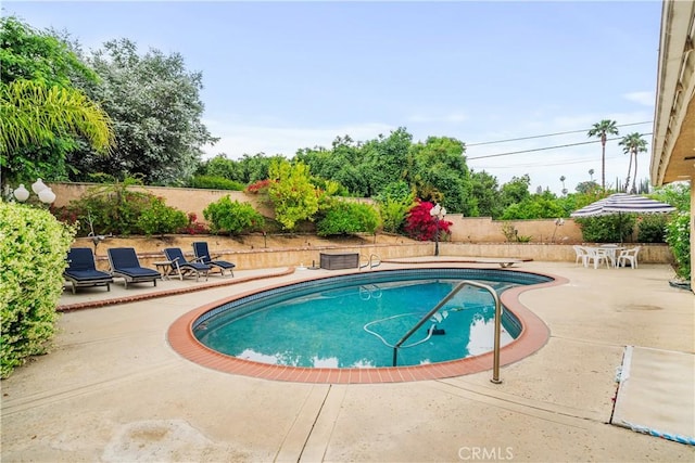 1641 Ford St, Redlands, CA 92373 - view of pool featuring a patio area and a fenced backyard