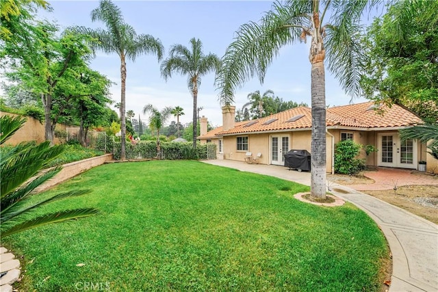 1641 Ford St, Redlands, CA 92373 - view of yard with french doors and a patio area