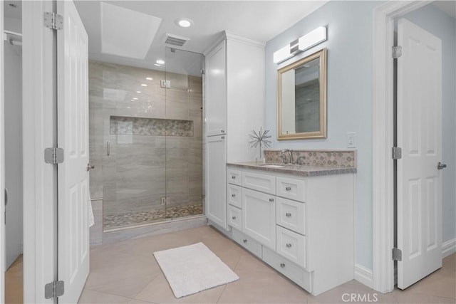 1641 Ford St, Redlands, CA 92373 - full bathroom with vanity, a shower stall, tile patterned floors, recessed lighting, and baseboards
