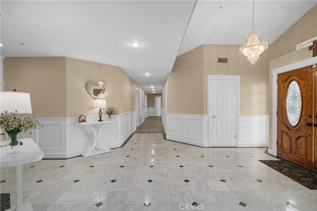 1641 Ford St, Redlands, CA 92373 - entrance foyer with a chandelier, wainscoting, light tile patterned floors, a decorative wall, and recessed lighting