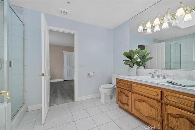 1641 Ford St, Redlands, CA 92373 - full bath with toilet, a shower with door, vanity, tile patterned flooring, and baseboards
