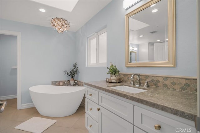 1641 Ford St, Redlands, CA 92373 - full bathroom featuring vanity, a freestanding bath, and tile patterned floors