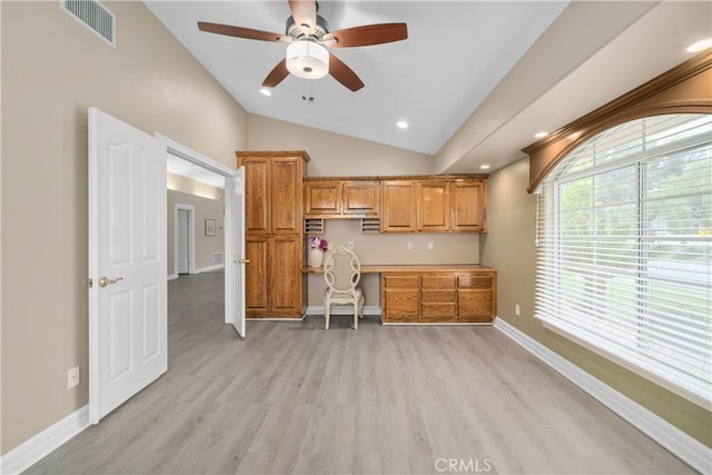 1641 Ford St, Redlands, CA 92373 - office space with built in desk, vaulted ceiling, ceiling fan, light wood-style floors, and baseboards
