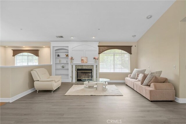 1641 Ford St, Redlands, CA 92373 - living room featuring baseboards, plenty of natural light, wood finished floors, and recessed lighting