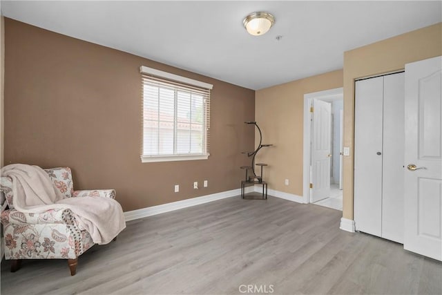 1641 Ford St, Redlands, CA 92373 - sitting room with light wood-style floors and baseboards
