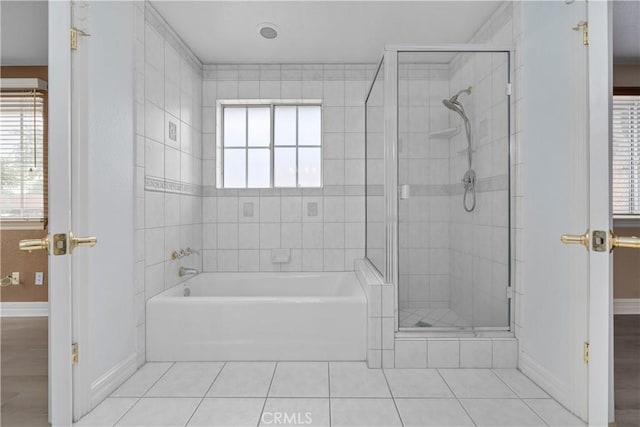 1641 Ford St, Redlands, CA 92373 - bathroom with baseboards, tile patterned floors, a shower stall, and a garden tub