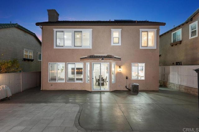 16231 Palomino Mesa Ct, San Diego, CA 92127 - back of house featuring a chimney, a patio area, stucco siding, and cooling unit