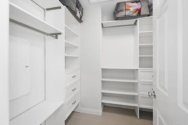 16231 Palomino Mesa Ct, San Diego, CA 92127 - walk in closet with light tile patterned floors