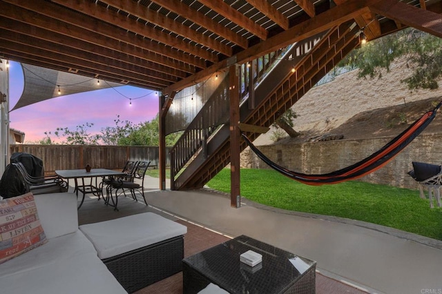 2292 Marquand Ct, Alpine, CA 91901 - patio terrace at dusk featuring a patio area, stairs, and outdoor dining space