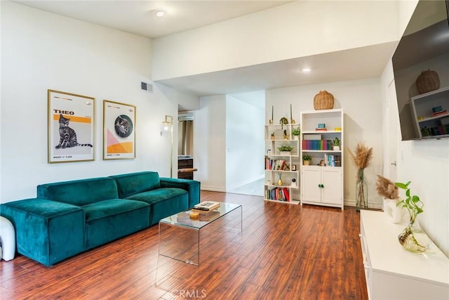23292 Orange Ave Unit 6, Lake Forest, CA 92630 - living area featuring wood finished floors, baseboards, lofted ceiling, and recessed lighting