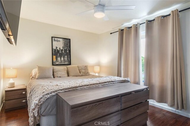 23292 Orange Ave Unit 6, Lake Forest, CA 92630 - bedroom with dark wood-style floors and a ceiling fan