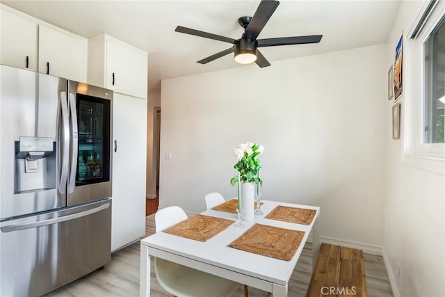23292 Orange Ave Unit 6, Lake Forest, CA 92630 - dining area with light wood finished floors and a ceiling fan