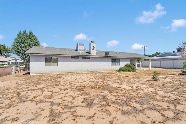 8960 Guava Ave, Hesperia, CA 92345 - back of house featuring a chimney