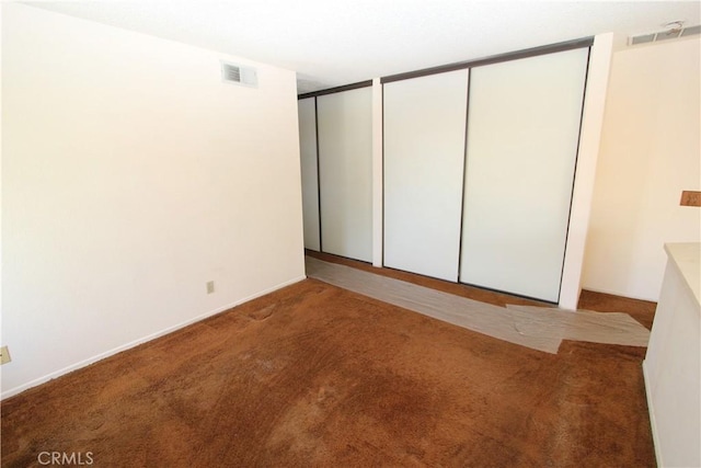 23362 La Mar Unit A, Mission Viejo, CA 92691 - unfurnished bedroom featuring carpet, multiple closets, and baseboards