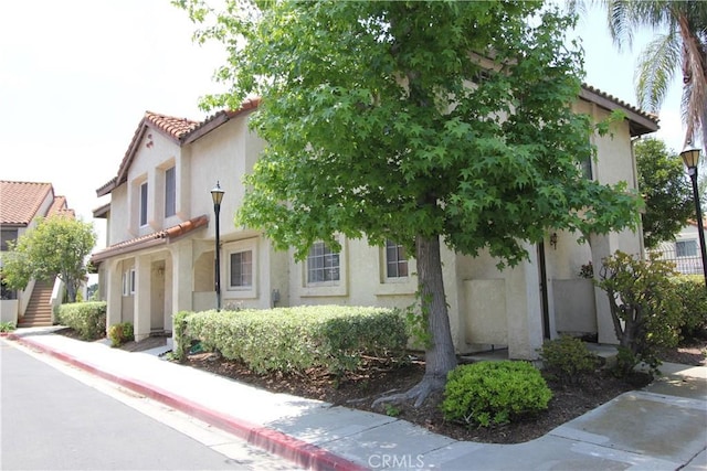 23362 La Mar Unit A, Mission Viejo, CA 92691 - mediterranean / spanish house featuring stucco siding and a tile roof